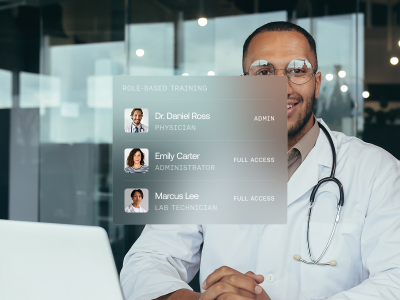 Physician reviewing role-based training that sets staff access levels