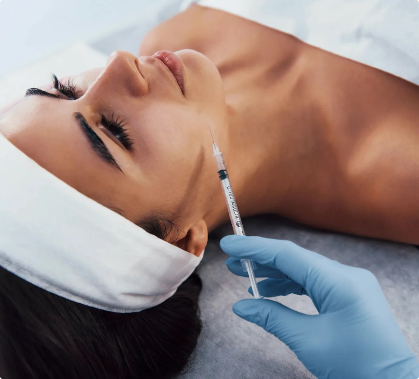 Aesthetics provider performing a skincare treatment