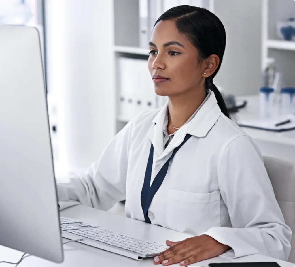 Clinician working at an IV clinic workstation