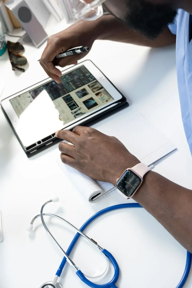 Provider reviewing lab diagnostics on a tablet